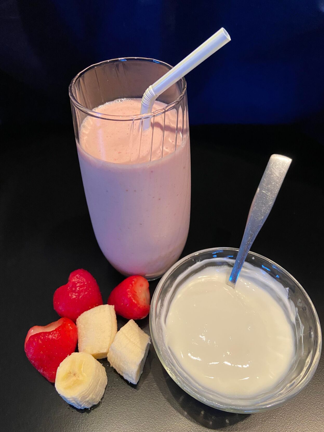 smoothie and fruit on table